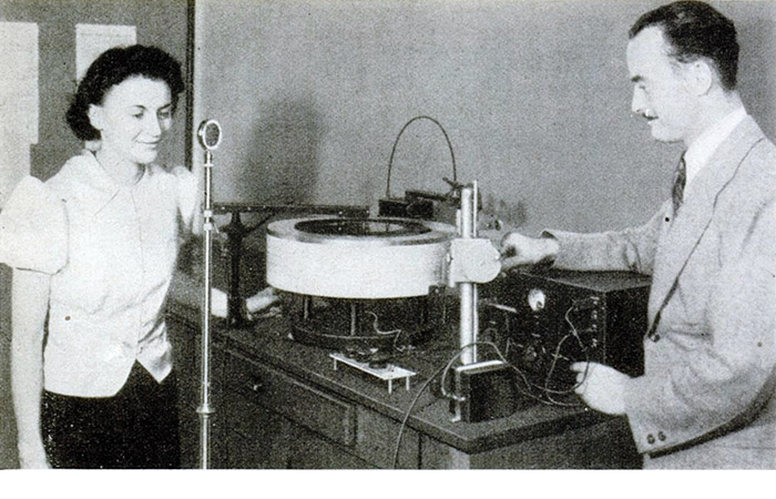 a woman and man making a vibrograph