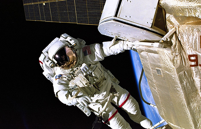 an astronaut on a spacewalk