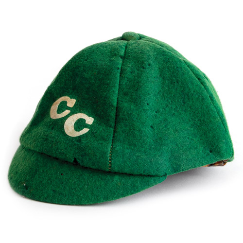 green baseball cap 