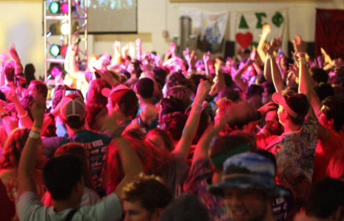 a large crowd of students dancing