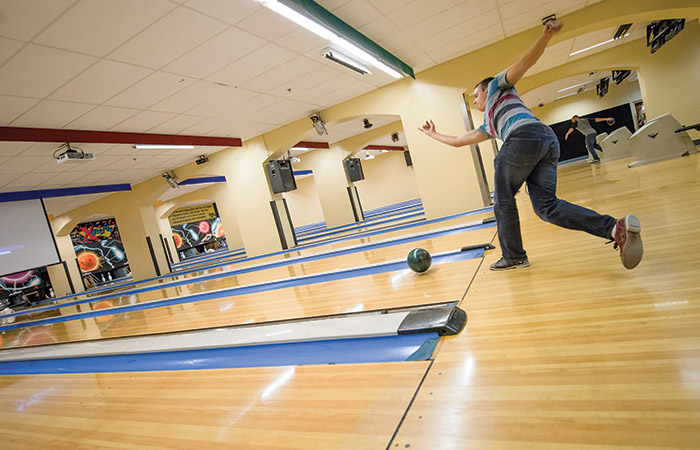 a bowler throws the ball down the lane