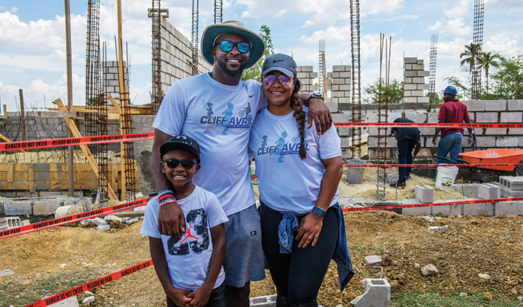 Avril and his family on the construction site