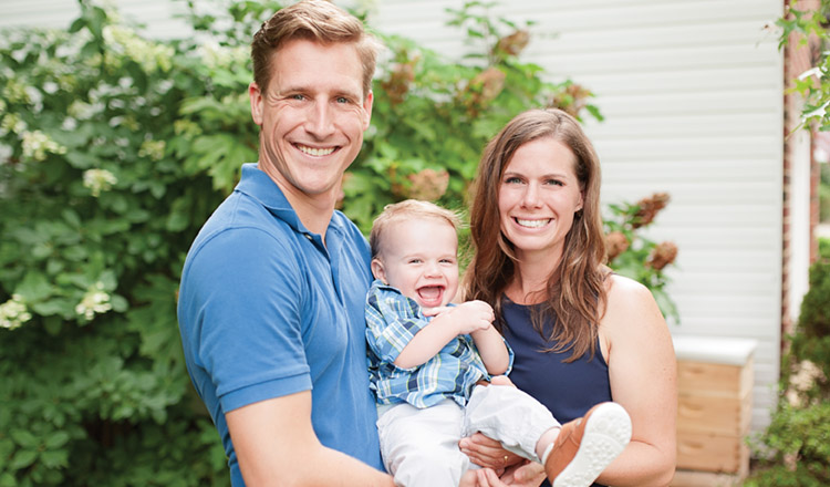 Casey and her husband and child