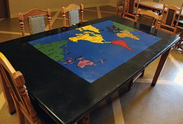 A table with the Risk board painted on top