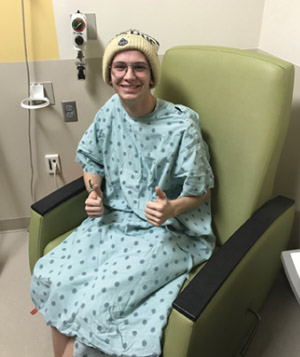 Tyler Trent in a hospital gown