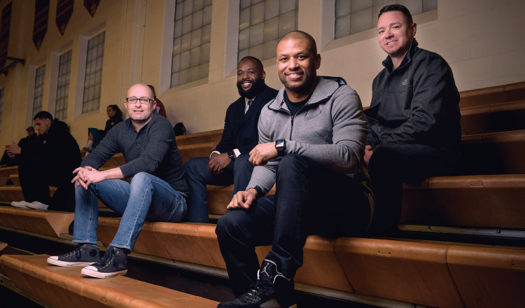 Winston with his high school friends Brandon Folck, Michael Wallace, and Bryan Conway