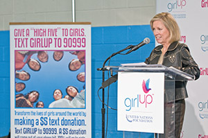 Cathy Calvin speaking at Girl Up event