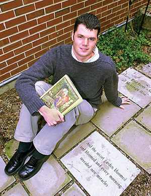 John Haven (A’01) poses in the secret garden at Duncan Hall in 1998. 