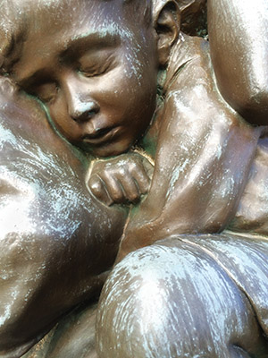 Tired boy sculpture